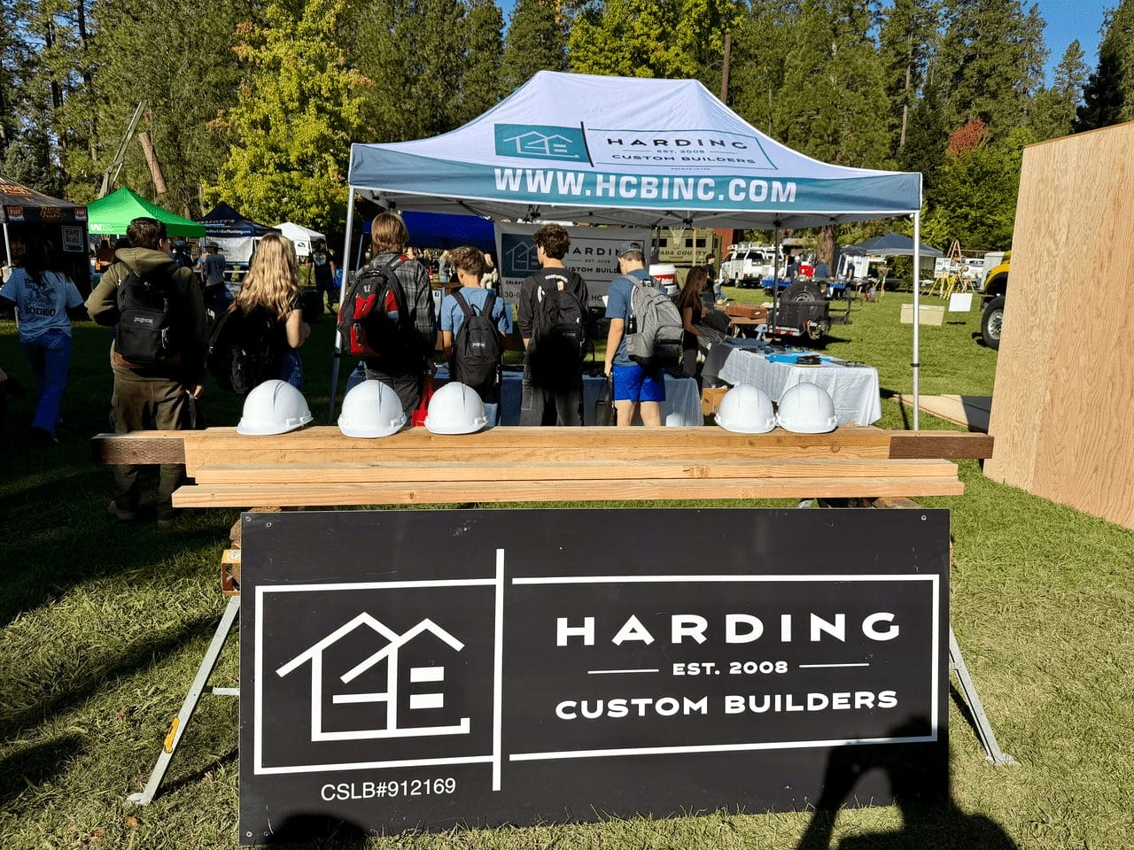 Harding Custom Builders display table at a local community event